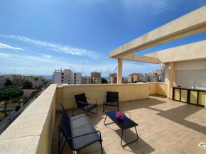 Attic with great terrace close to the sea